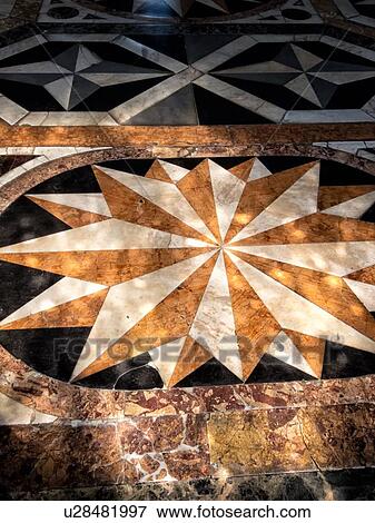 Scuola Grande dei Carmini: detail of exquisite inlaid marble flooring with three dimensional star design in white and red on black background, Venice, Italy View Large Photo Image Stock Photo - Scuola Grande dei Carmini: detail of exquisite inlaid marble flooring with three dimensional star design in white and red on black background, Venice, Italy. Fotosearch