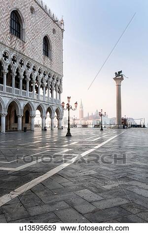 The Doge's Palace at dawn with empty Piazzetta, column with lion of San Marco, view to San Giorgio Maggiore beyond, Venice, Italy, View Large Photo Image Stock Photo - The Doge's Palace at dawn with empty Piazzetta, column with lion of San Marco, view to San Giorgio Maggiore beyond, Venice, Italy,. Fotosearch