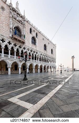 The Doge's Palace at dawn with empty Piazzetta, column with lion of San Marco, view to San Giorgio Maggiore beyond, Venice, Italy, View Large Photo Image Stock Photo - The Doge's Palace at dawn with empty Piazzetta, column with lion of San Marco, view to San Giorgio Maggiore beyond, Venice, Italy,. Fotosearch