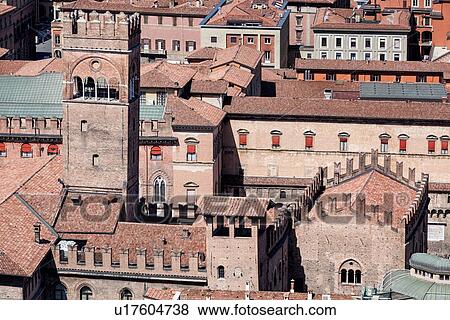 Stock Photo - View from Torre Asinelli of Bologna looking over Palazzo Re Enzo and Toerr dell'Asengo, with the red-tiled roofs of the city, Bologna, Italy. Fotosearch