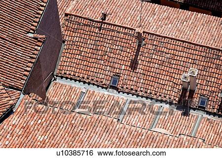 Stock Photograph - View from Torre Asinelli of Bologna looking over red-tiled roofs of the city, detailed view, Bologna, Italy. Fotosearch