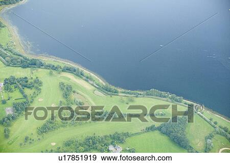 Stock Photo - Aerial view of rural fields and lake. Fotosearch