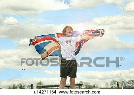 Boy wearing British flag outdoors View Large Photo Image Picture - Boy wearing British flag outdoors. Fotosearch