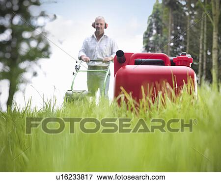Can of gasoline on grassy lawn View Large Photo Image Stock Photo - Can of gasoline on grassy lawn. Fotosearch