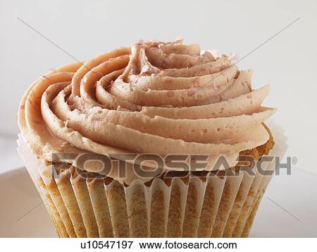 Close up of frosted cupcake View Large Photo Image Stock Photo - Close up of frosted cupcake. Fotosearch
