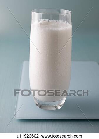 Close up of glass of milk View Large Photo Image Stock Image - Close up of glass of milk. Fotosearch