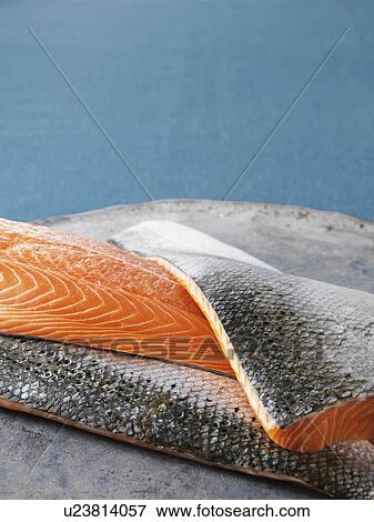 Stock Photo - Close up of salmon filets. Fotosearch