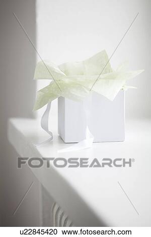 Close up of unwrapped gift box View Large Photo Image Stock Image - Close up of unwrapped gift box. Fotosearch