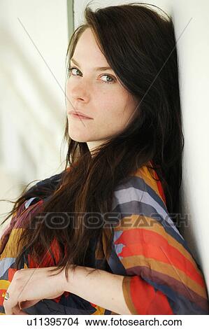 Close up of woman sitting on bench View Large Photo Image Picture - Close up of woman sitting on bench. Fotosearch
