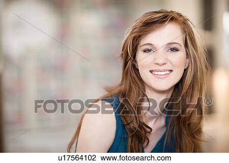 Stock Image - Close up of woman’s smiling face. Fotosearch