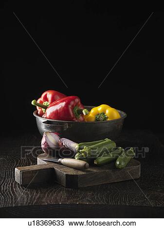 Stock Image - Cucumbers, onion and bell peppers. Fotosearch