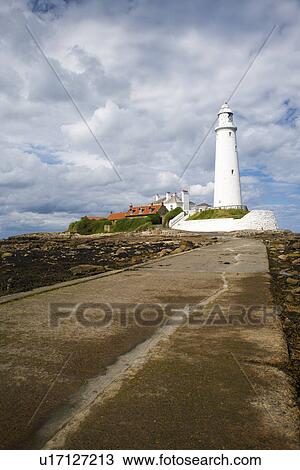 Lighthouse overlooking coastline View Large Photo Image Stock Image - Lighthouse overlooking coastline. Fotosearch