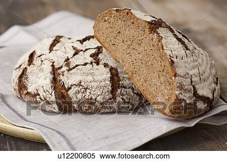 Loaves of sourdough bread View Large Photo Image Stock Photography - Loaves of sourdough bread. Fotosearch
