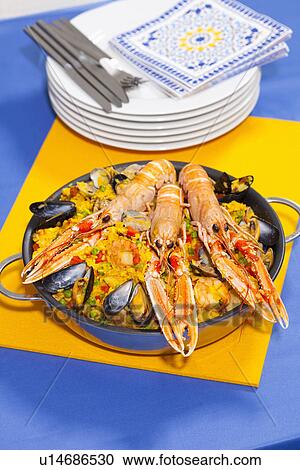 Pan of craw fish paella View Large Photo Image Stock Image - Pan of craw fish paella. Fotosearch