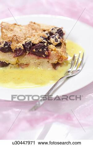 Plate of baked fruit crisp in sauce View Large Photo Image Stock Image - Plate of baked fruit crisp in sauce. Fotosearch