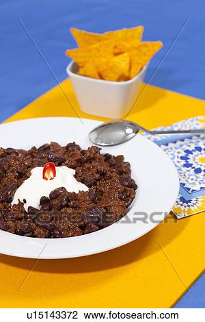 Plate of chili con carne with sour cream View Large Photo Image Stock Image - Plate of chili con carne with sour cream. Fotosearch