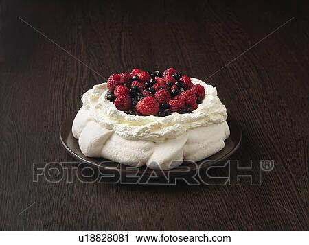 Stock Image - Plate of fruit pavlova. Fotosearch