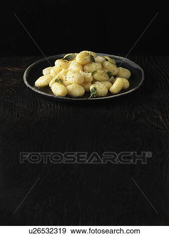Plate of gnocchi with parmesan View Large Photo Image Stock Photo - Plate of gnocchi with parmesan. Fotosearch