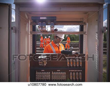 Railway worker at signal station View Large Photo Image Stock Image - Railway worker at signal station. Fotosearch