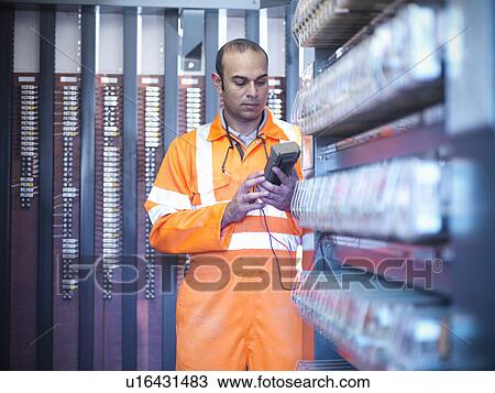 Railway worker checking circuits View Large Photo Image Stock Image - Railway worker checking circuits. Fotosearch