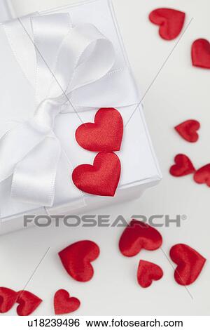 Satin hearts on gift box View Large Photo Image Stock Photograph - Satin hearts on gift box. Fotosearch