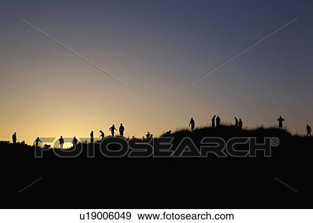 Silhouettes of people on rural hilltops View Large Photo Image Stock Photo - Silhouettes of people on rural hilltops. Fotosearch