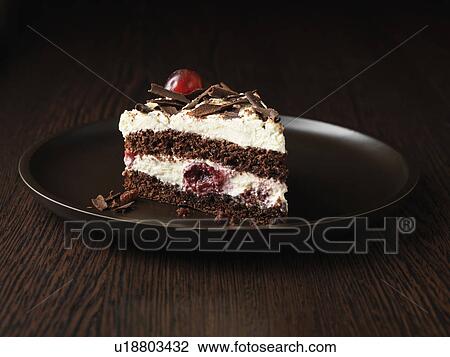 Stock Image - Slice of forest gateau cake. Fotosearch