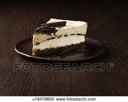 Slice of tiramisu cake View Large Photo Image Stock Photo - Slice of tiramisu cake. Fotosearch