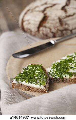 Sliced sourdough bread with butter View Large Photo Image Stock Photo - Sliced sourdough bread with butter. Fotosearch