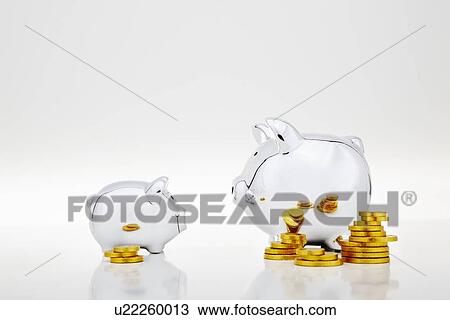 Stacks of gold coins by piggy banks View Large Photo Image Stock Image - Stacks of gold coins by piggy banks. Fotosearch