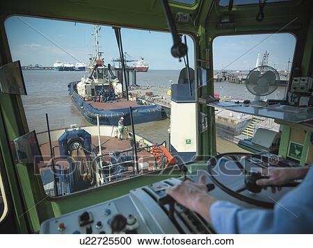 Tugboats in urban harbor View Large Photo Image Stock Image - Tugboats in urban harbor. Fotosearch