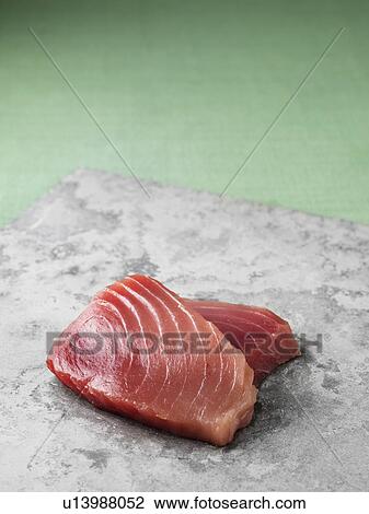 Tuna filets on marble board View Large Photo Image Stock Image - Tuna filets on marble board. Fotosearch