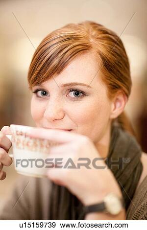 Stock Photo - Woman drinking cup of coffee. Fotosearch