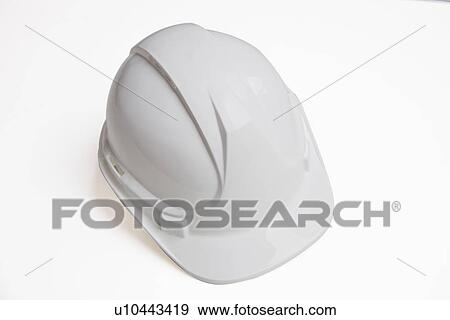 Close-up of hard hat over white background View Large Photo Image Stock Photo - Close-up of hard hat over white background. Fotosearch