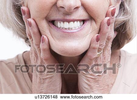 Stock Photo - Close up view on senior dentures. Fotosearch