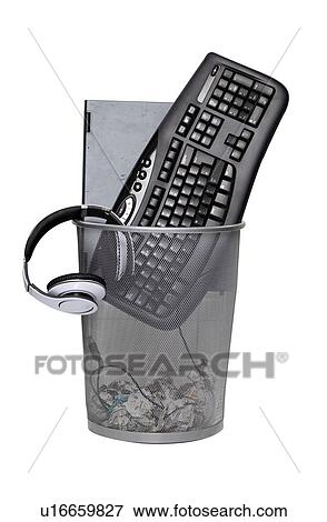 Computer keyboard and headphones in wastebasket against white background View Large Photo Image Stock Photo - Computer keyboard and headphones in wastebasket against white background. Fotosearch