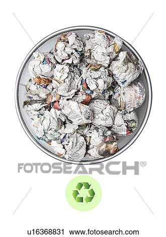 Crumpled papers in garbage bin with recycling sign over white background View Large Photo Image Stock Image - Crumpled papers in garbage bin with recycling sign over white background. Fotosearch