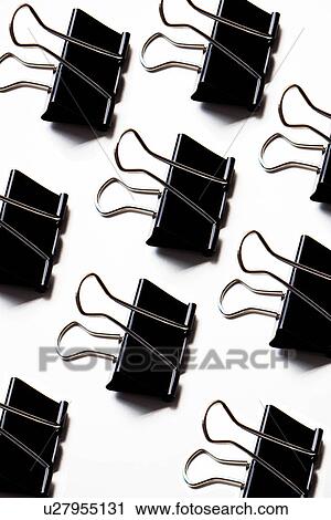 Group of binder clips over white background View Large Photo Image Stock Image - Group of binder clips over white background. Fotosearch