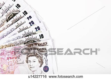 Group of pound notes against white background View Large Photo Image Stock Photograph - Group of pound notes against white background. Fotosearch