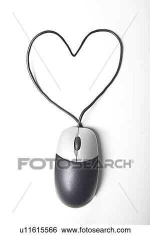 Heart shape made up of computer mouse wire over white background View Large Photo Image Stock Photograph - Heart shape made up of computer mouse wire over white background. Fotosearch