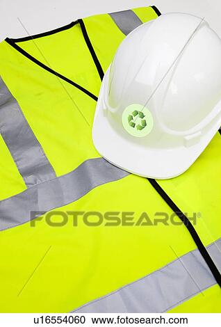 Safety vest and hard hat with recycling symbol over white background View Large Photo Image Stock Image - Safety vest and hard hat with recycling symbol over white background. Fotosearch