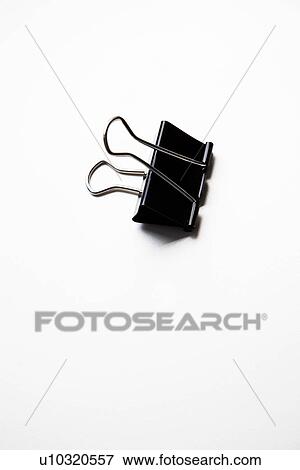 Single binder clip over white background View Large Photo Image Stock Photo - Single binder clip over white background. Fotosearch