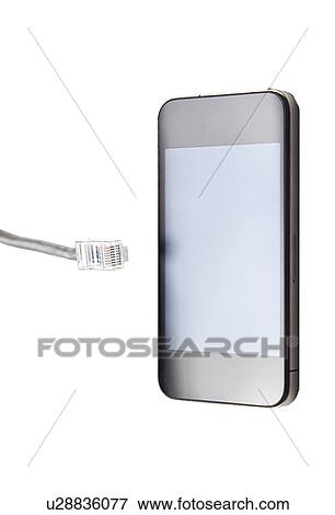 Smart phone with data cable plug over white background View Large Photo Image Stock Photo - Smart phone with data cable plug over white background. Fotosearch