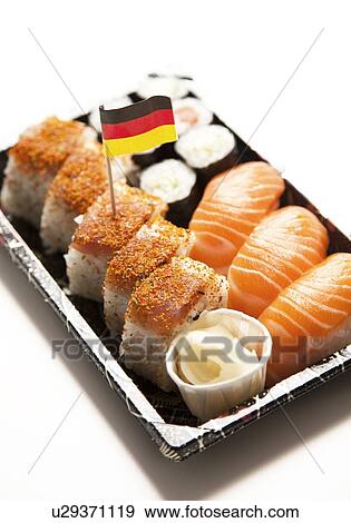 Sushi food on tray with German flag against white background View Large Photo Image Stock Photo - Sushi food on tray with German flag against white background. Fotosearch
