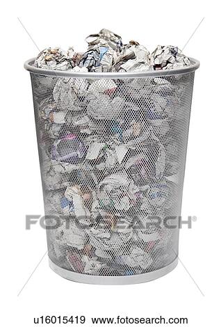 Wastebasket full of crumpled paper over white background View Large Photo Image Stock Photo - Wastebasket full of crumpled paper over white background. Fotosearch