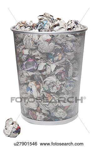 Wastepaper basket with papers lying over white background View Large Photo Image Stock Photograph - Wastepaper basket with papers lying over white background. Fotosearch