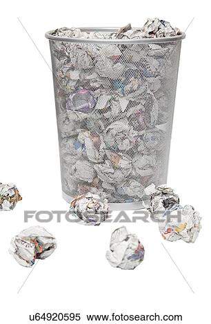 Wastepaper basket with papers lying around over white background View Large Photo Image Stock Photography - Wastepaper basket with papers lying around over white background. Fotosearch