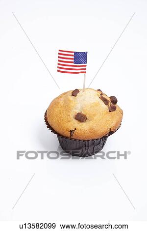 Stock Photo - American flag in cupcake over white background. Fotosearch