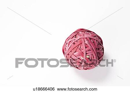 Close-up of rubber band ball over white background View Large Photo Image Stock Photograph - Close-up of rubber band ball over white background. Fotosearch