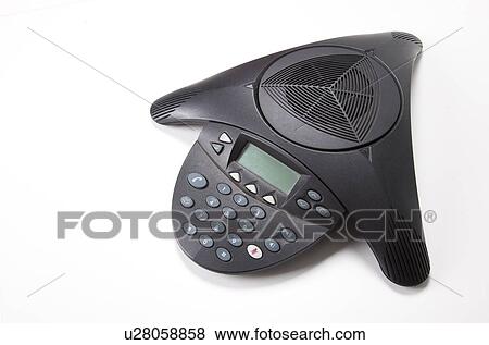 Stock Photo - Conference phone over white background. Fotosearch